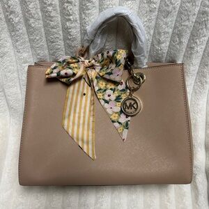 Michael Kors Pink Handbag with Floral Bow Accent